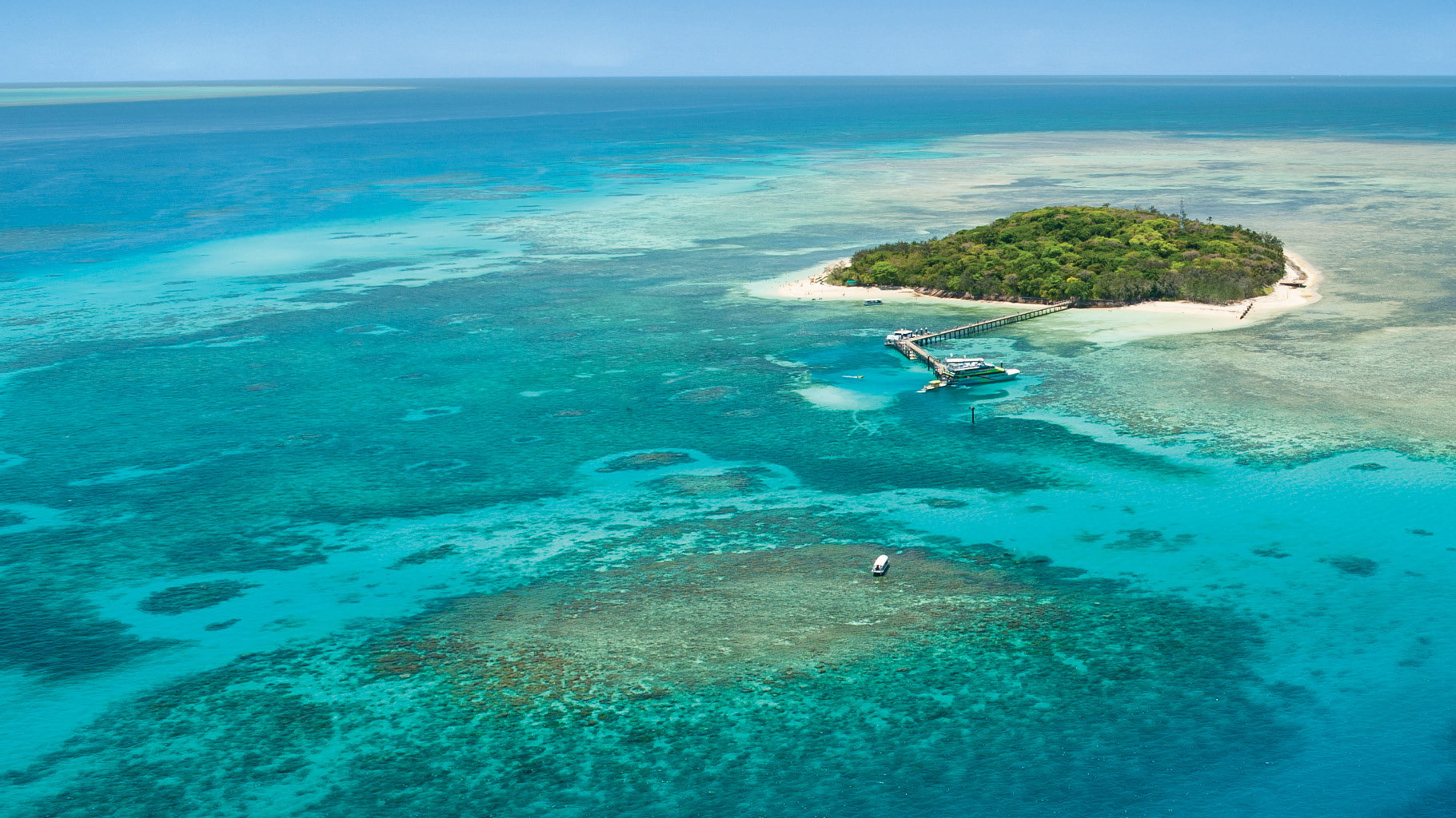 Cairns Tours. Great Barrier Reef. Island visit. Big Cat Green Island Drone Hero Shot